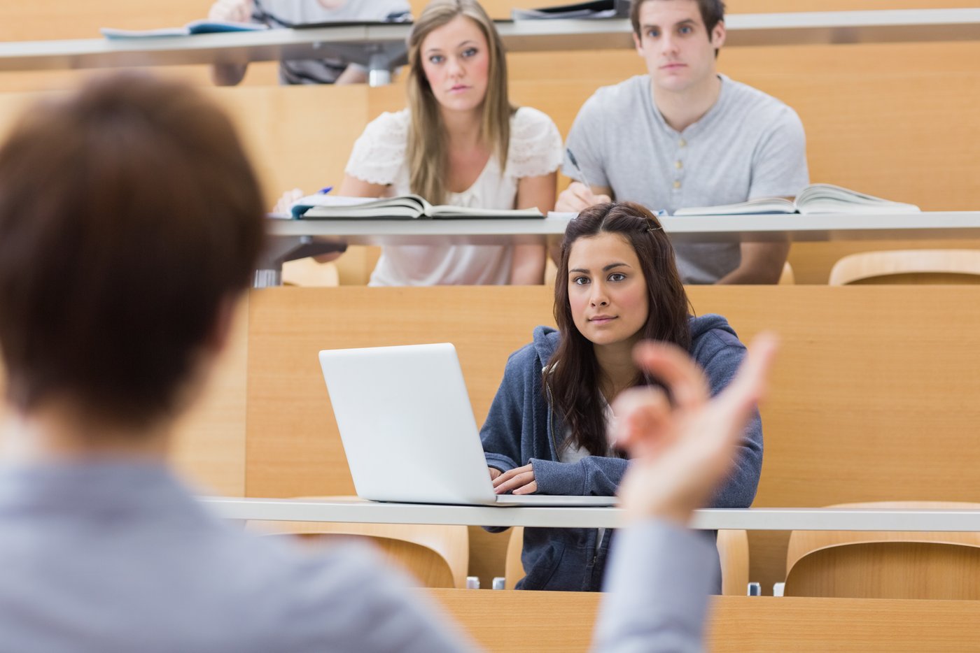 students-sitting-listening-teacher.jpg